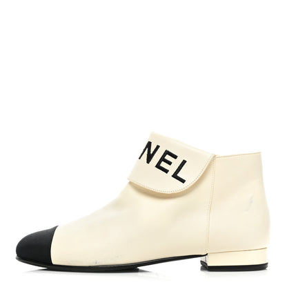Chanel Lambskin Grosgrain Fold Over Logo Cap Toe Boots 36.5 Ivory Black 1 of 15