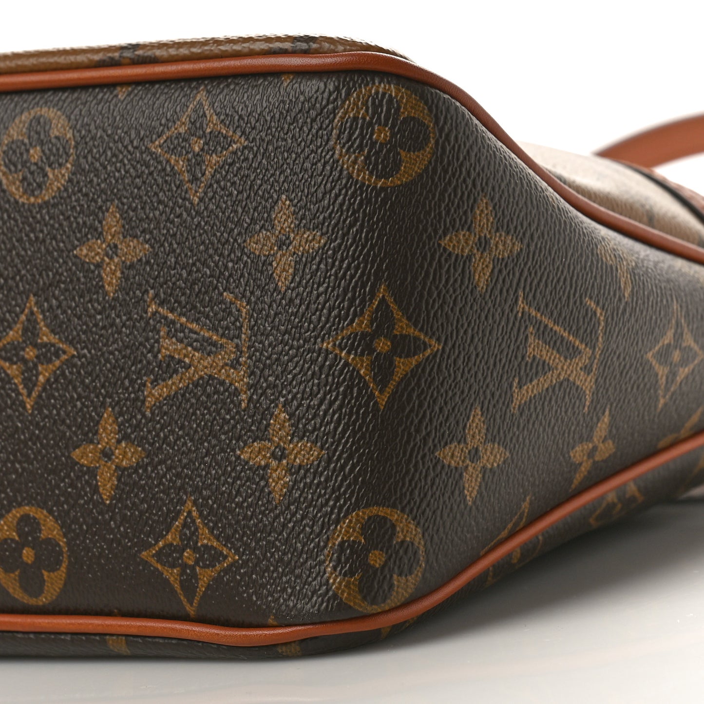 Reverse Monogram Dauphine Hobo PM