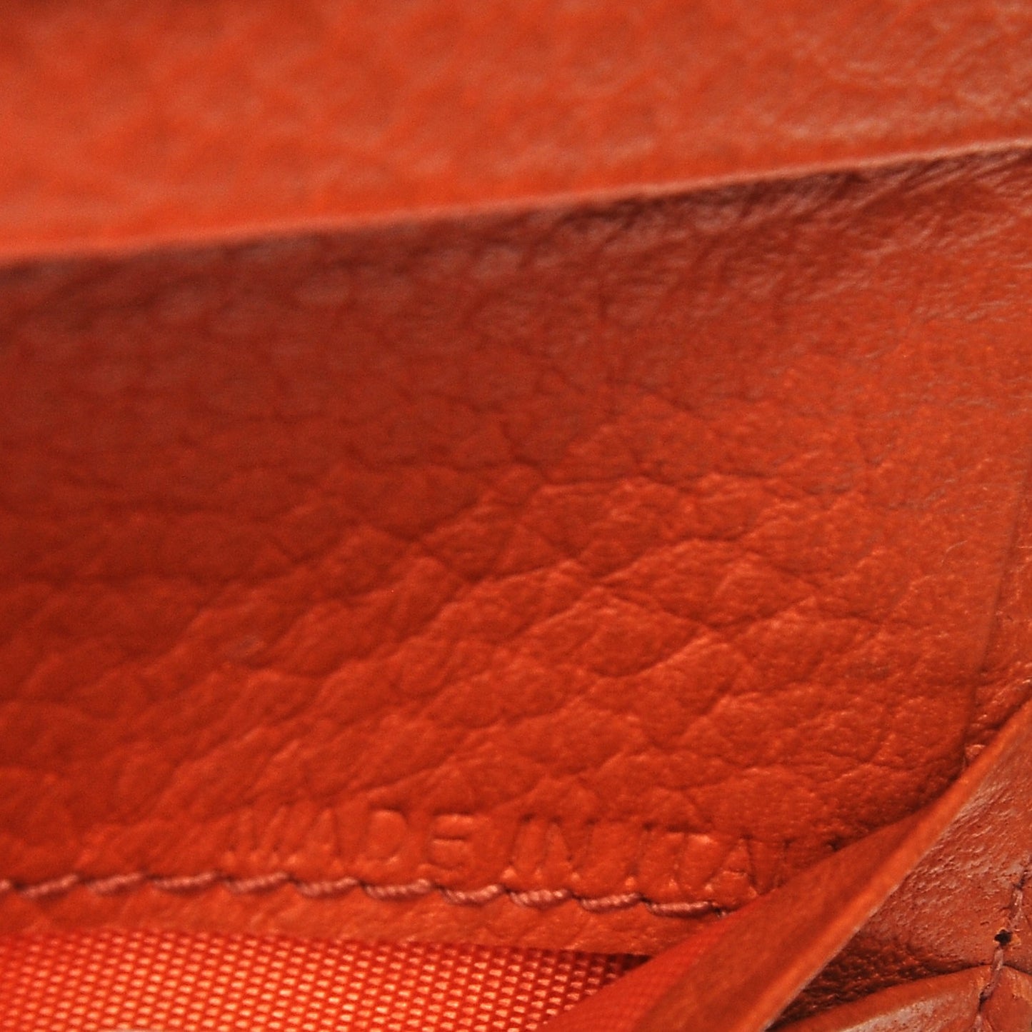 Pebbled Calfskin Rockstud Compact Zip Around Wallet Orange