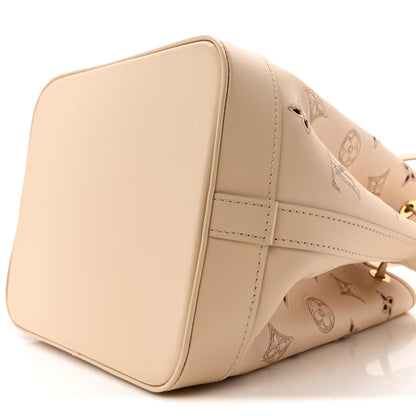 Louis Vuitton Calfskin Monogram Cutout Petit Noe Neutral 9 of 12