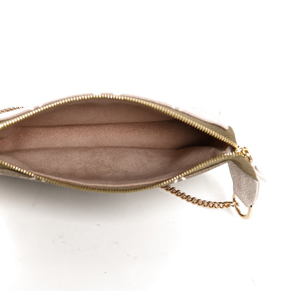 Louis Vuitton Empreinte Spring in the City Mini Pochette Accessories Kaki Beige Cream 4 of 8