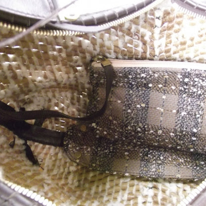 FASHIONPHILE SALVATOREFERRAGAMOWovenShearlingBag 7 of 12