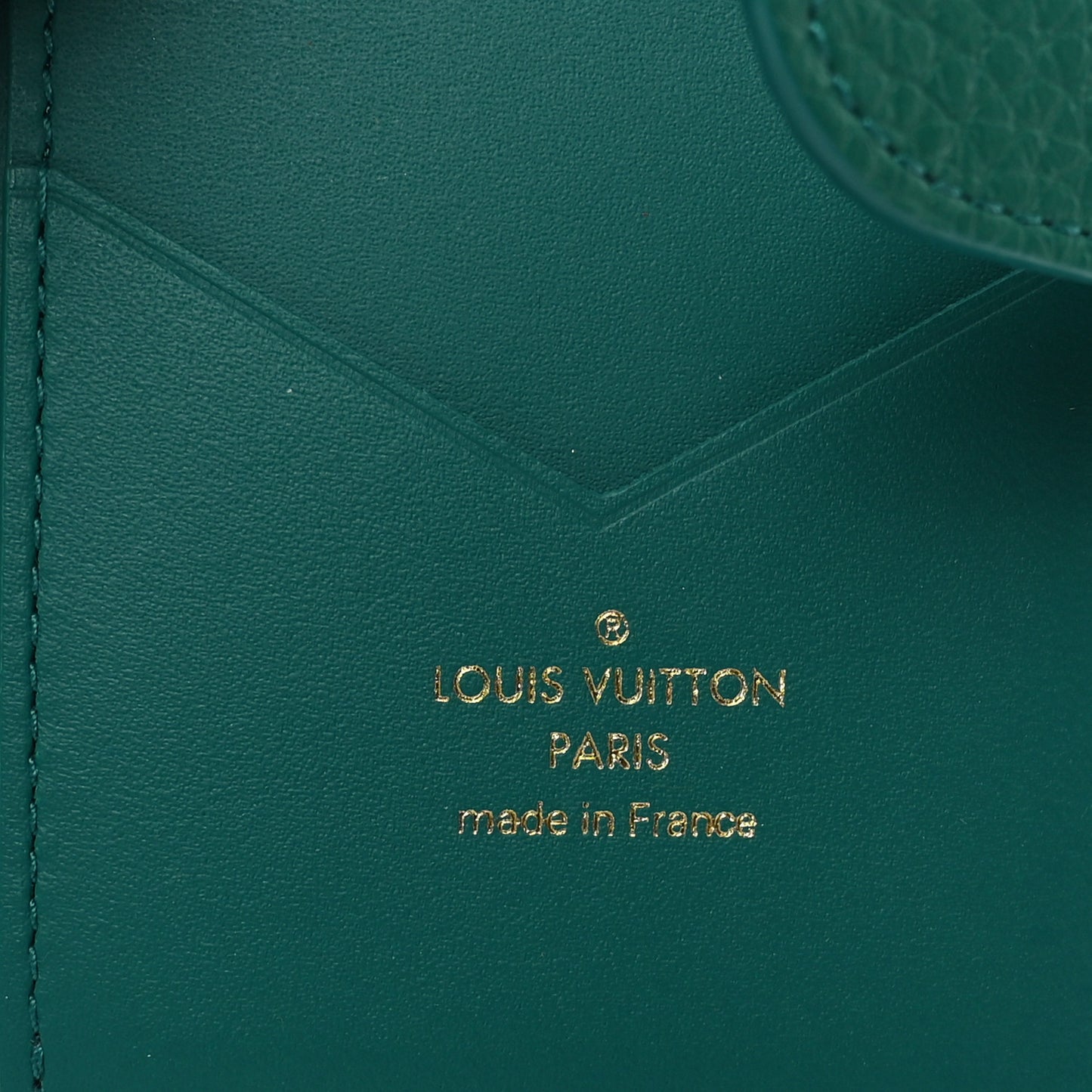 Taurillon Capucines Vertical Compact Wallet Green