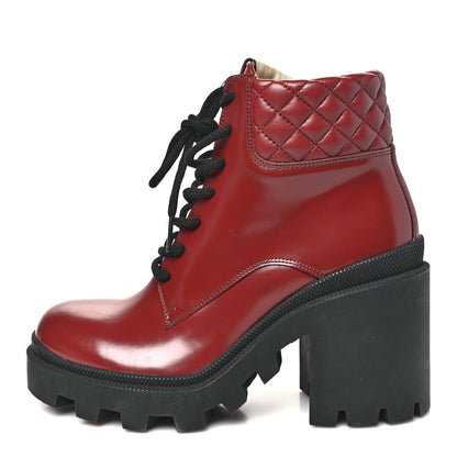 Gucci Magnum Calfskin Nappa Quilted Lace Up Ankle Boots 38.5 Garnet Red 1 of 10
