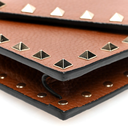 Valentino Garavani Pebbled Calfskin Rockstud Envelope Wallet on Chain Bright Cognac 9 of 9