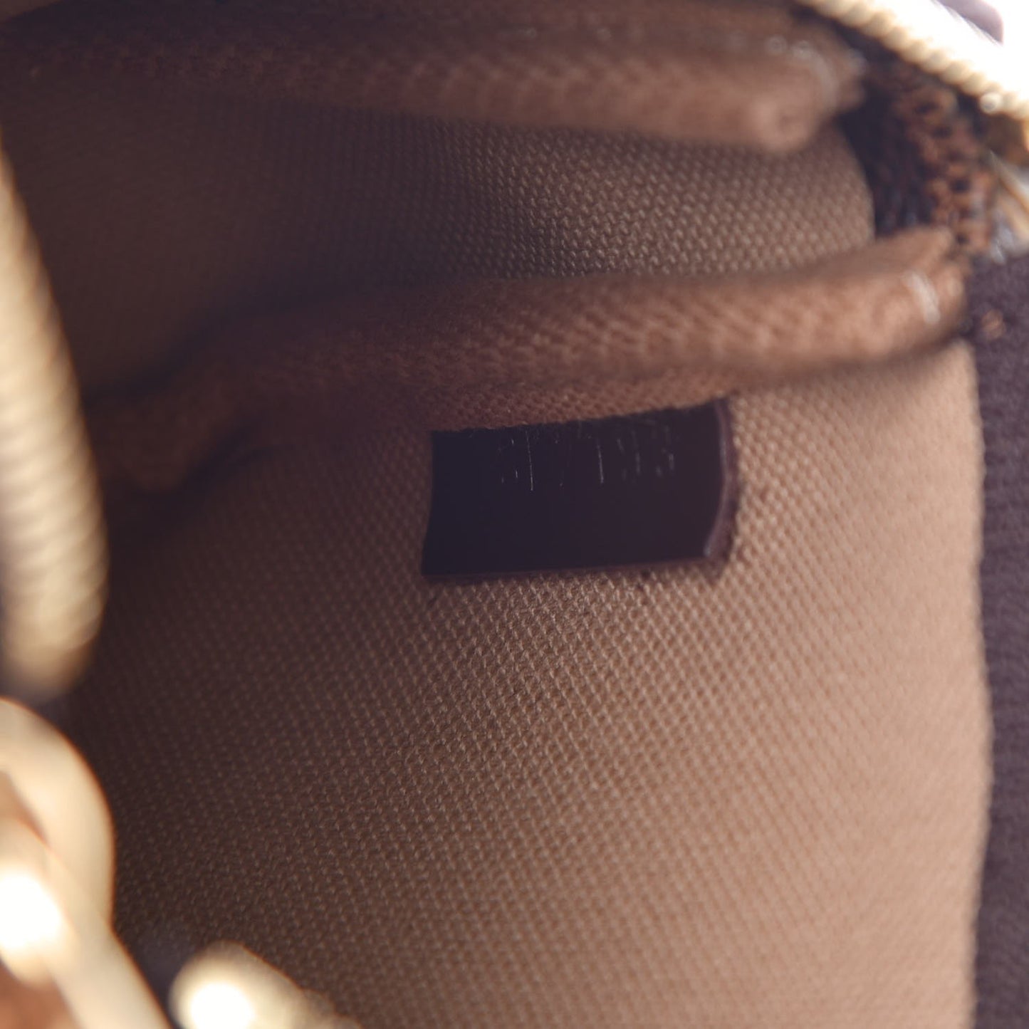 Damier Ebene Trunks and Locks Mini Pochette Accessories