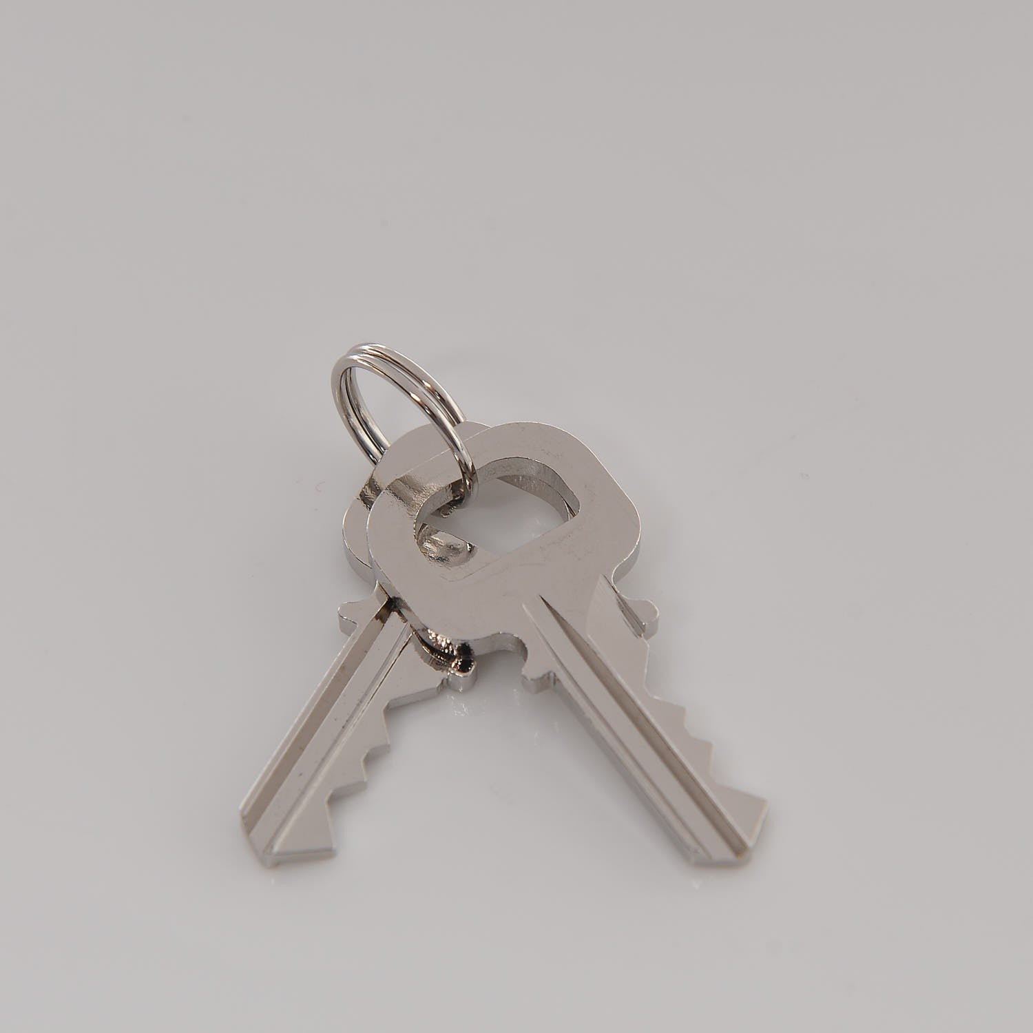 Louis Vuitton Polished Silver Lock and Key Set 3 of 4