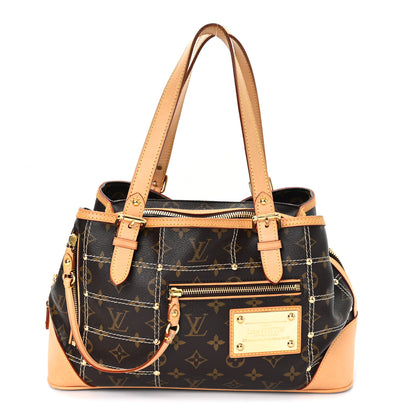 Louis Vuitton Monogram Riveting 1 of 9