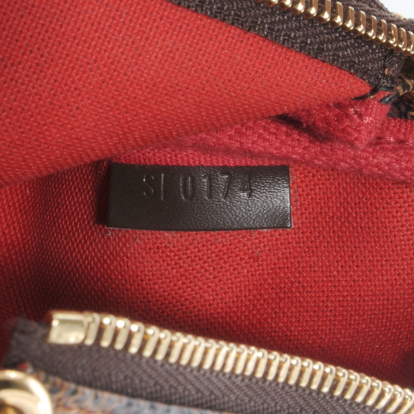 Damier Ebene Mini Pochette Accessories Bag