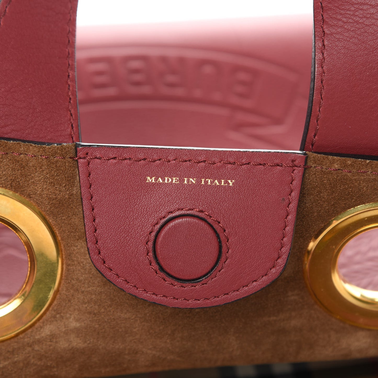 Smooth Calfskin Small Grommet Embossed Crest Bag Red
