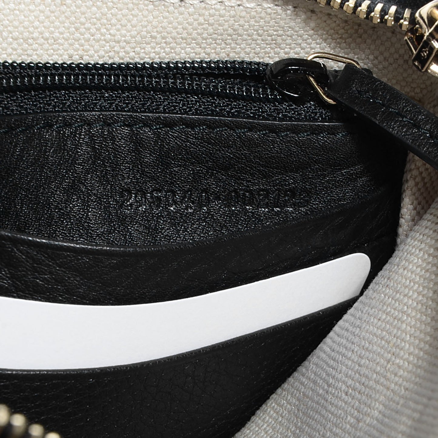 Pebbled Calfskin Soho Wristlet Black