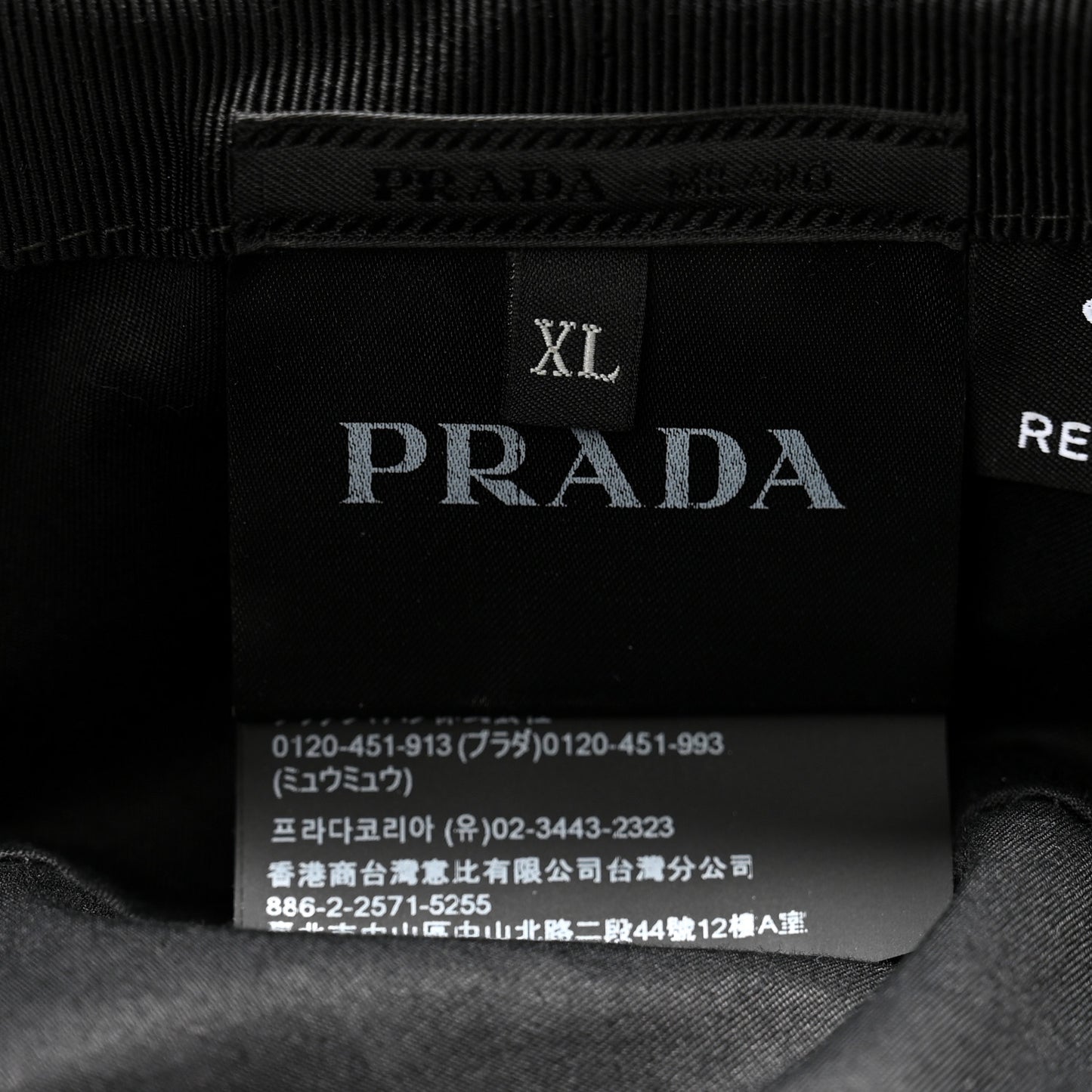 Re-Nylon Metal Triangle Logo Bucket Hat XL Black