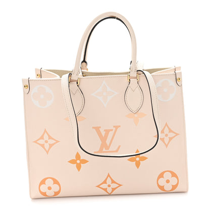 Louis Vuitton Empreinte Monogram Giant By The Pool Onthego MM Cream Saffron 1 of 9