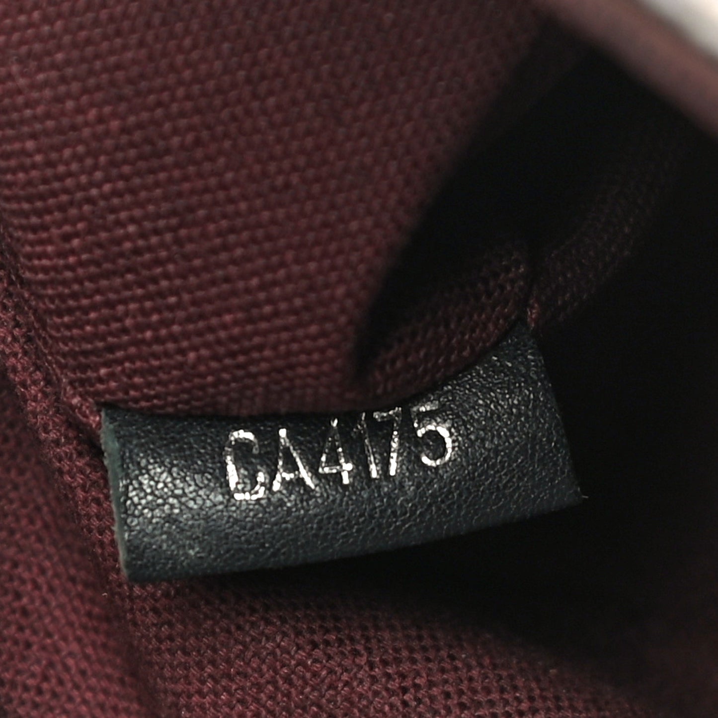 Monogram Macassar District PM