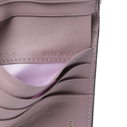 Valentino Garavani Metallic Wrinkled Lambskin Rockstud Spike Compact Zip Around Wallet Lipstick 7 of 7