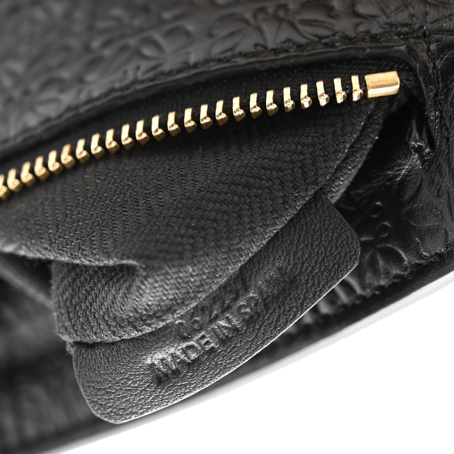 Calfskin Embossed Mini Repeat T Pouch Black