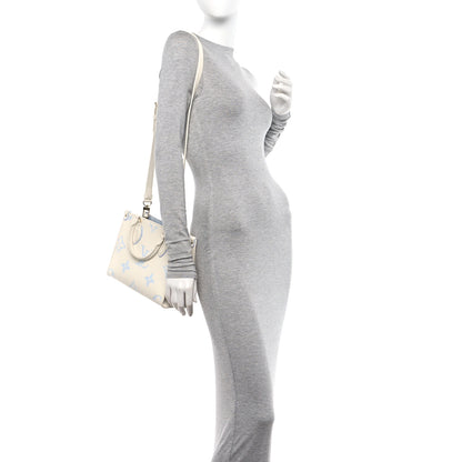 Louis Vuitton Empreinte Monogram Giant Onthego PM Latte Candy Blue 2 of 9