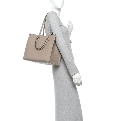 Louis Vuitton Empreinte Monogram Giant Onthego MM Tourterelle 2 of 10