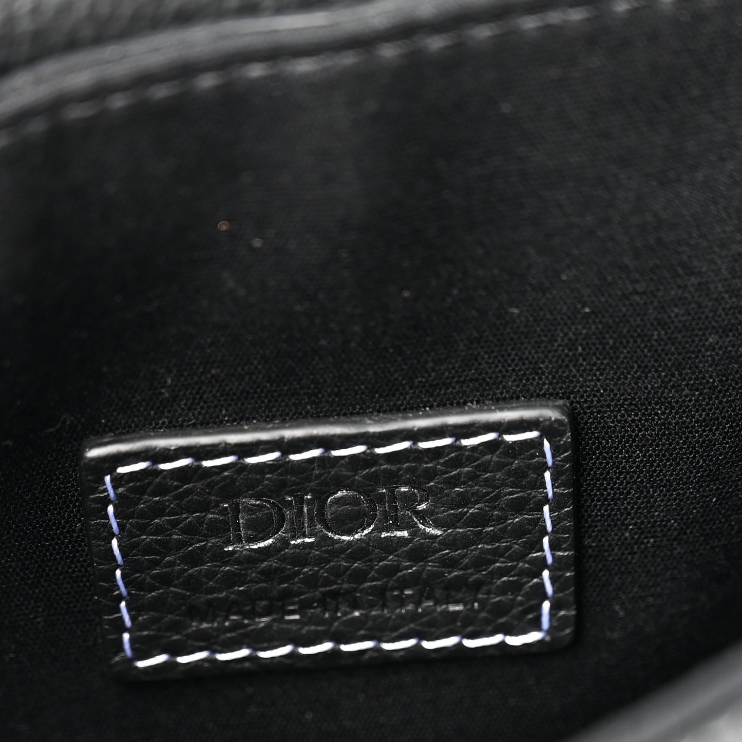 X KAWS Grained Calfskin Saddle Pouch Black