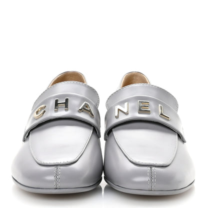 Chanel Shiny Calfskin Logo Loafers 37 Light Grey 3 of 10
