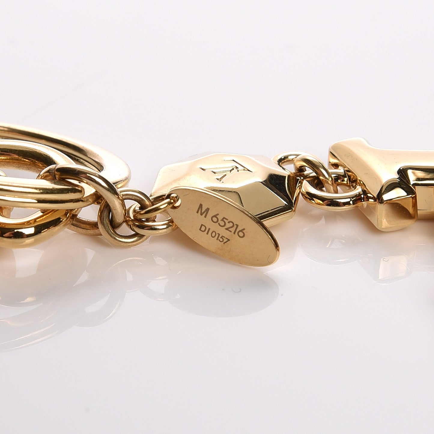 LV Facettes Bag Charm Key Holder Gold