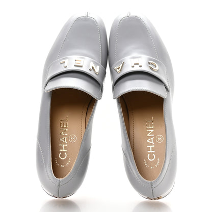 Chanel Shiny Calfskin Logo Loafers 37 Light Grey 2 of 10