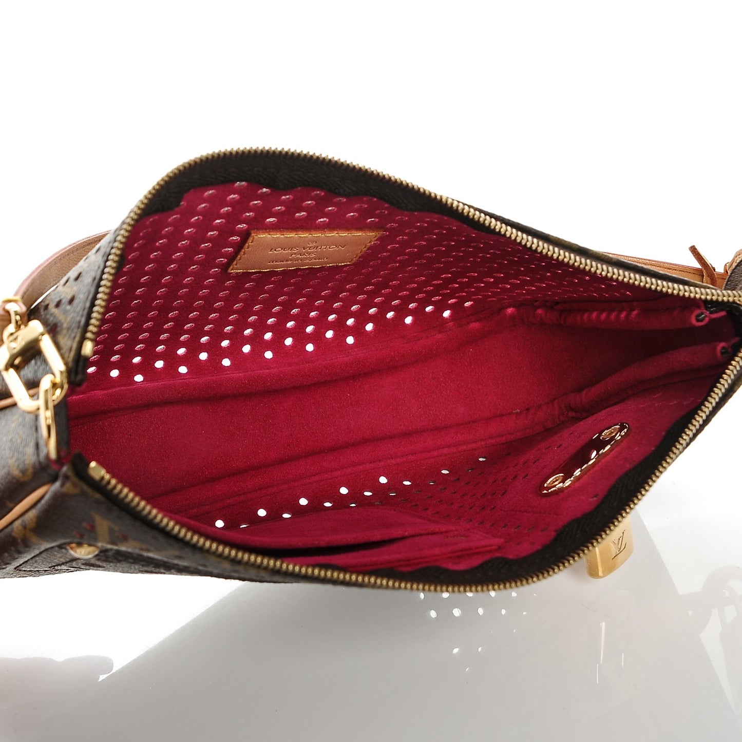 Monogram Perforated Pochette Accessories Bag Fuchsia