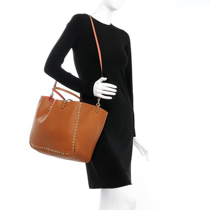 Valentino Garavani Pebbled Calfskin Medium Rockstud Reversible Tote Light Cuir Coral 2 of 11