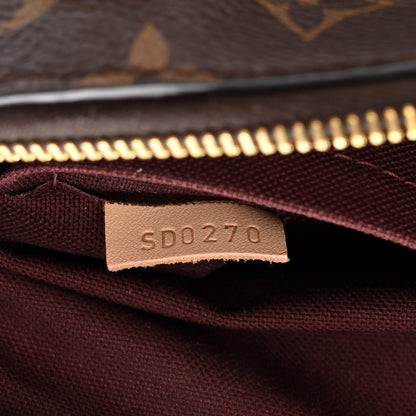 Louis Vuitton Monogram Rivoli MM 7 of 14