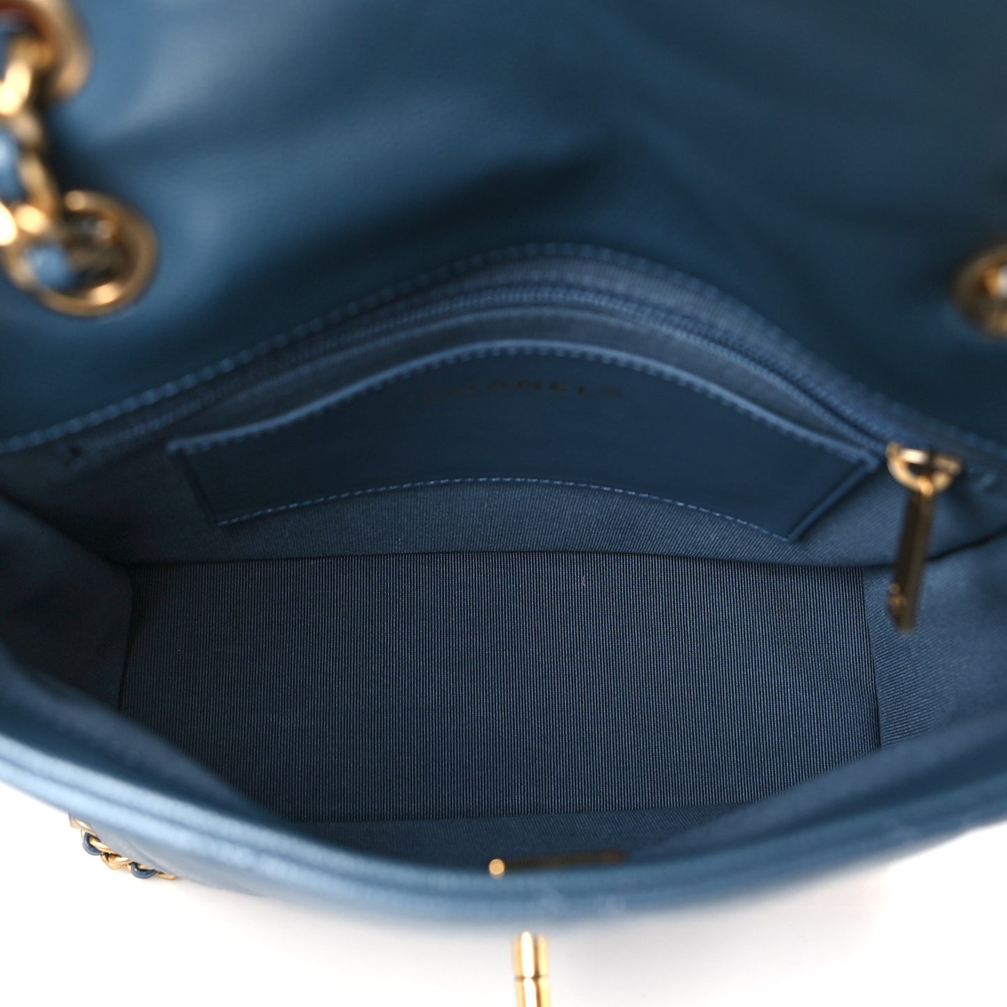 Caviar Quilted Camellia Chain Around Backpack Blue