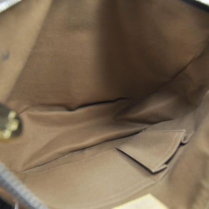 Louis Vuitton Monogram Tulum PM 7 of 11