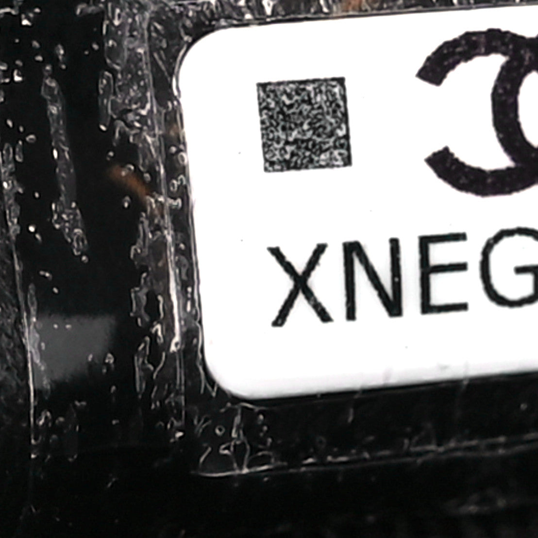 Caviar Quilted Boy Flap Clutch Black