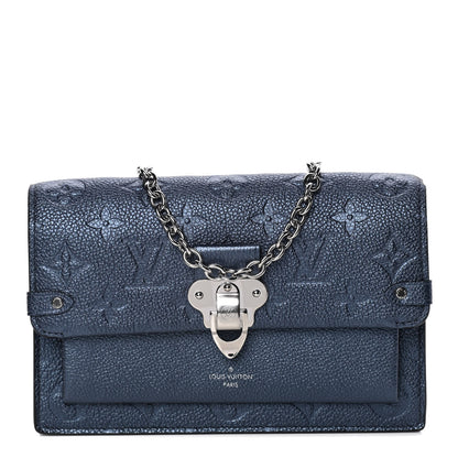 Louis Vuitton Metalli Empreinte Monogram Vavin Chain Wallet Navy Nacre 1 of 11