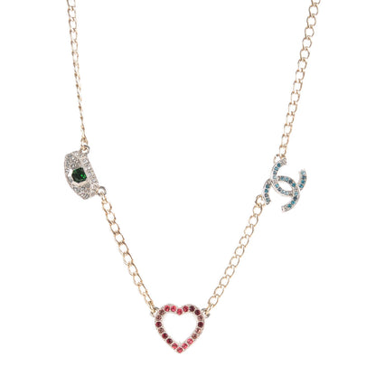 Chanel Crystal Heart Eye CC Charm Necklace Gold Silver 1 of 7