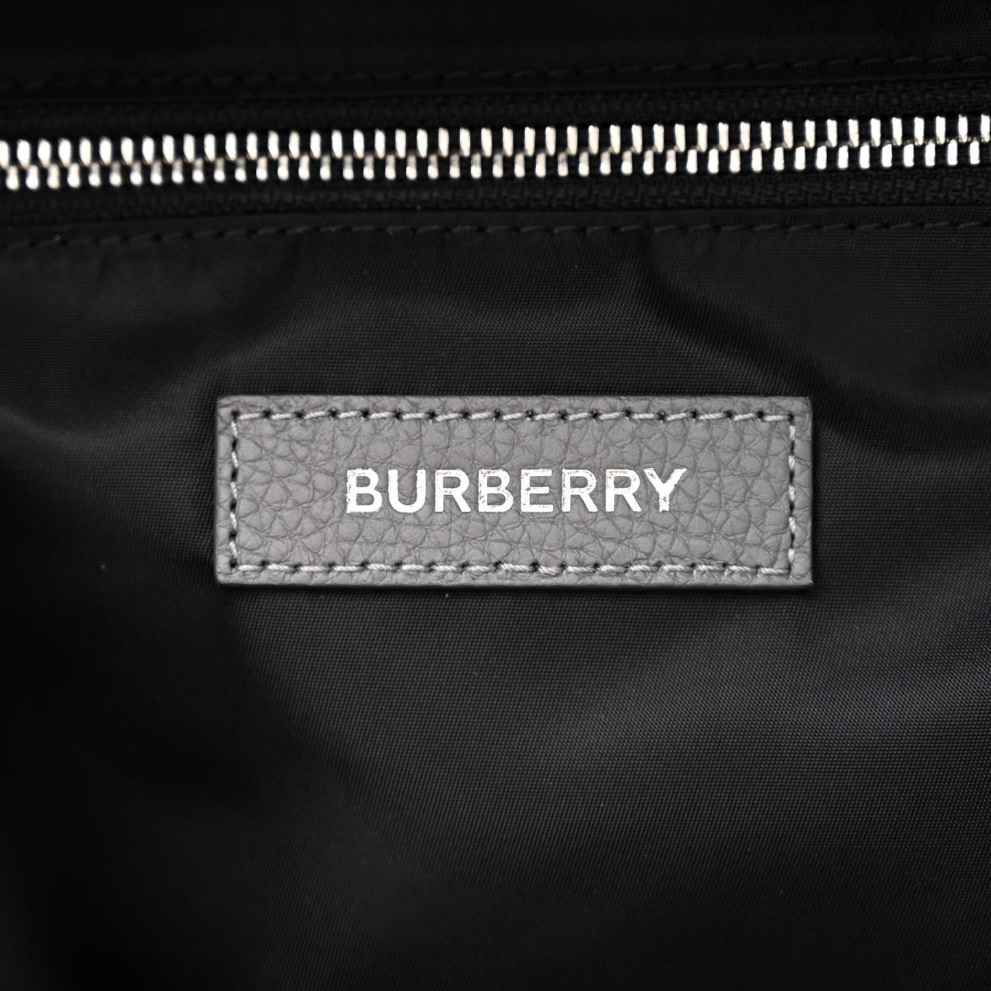 Calfskin Logo Embossed Backpack Charcoal Grey