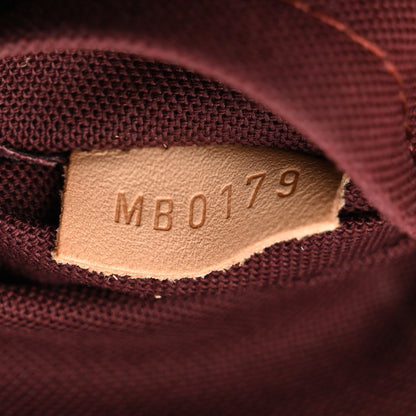 Louis Vuitton Monogram Rivoli PM 7 of 14