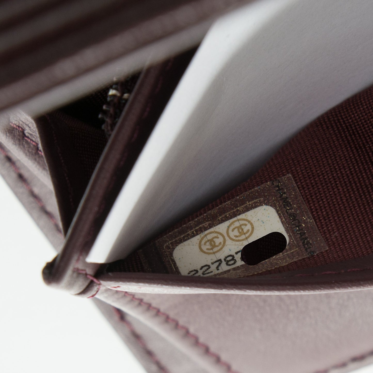 Caviar Quilted Boy Yen Wallet Dark Purple