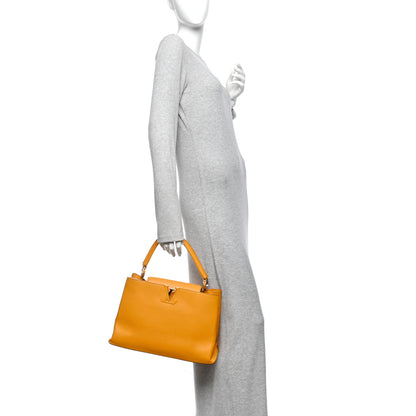 Louis Vuitton Taurillon Capucines MM Tournesol 2 of 10