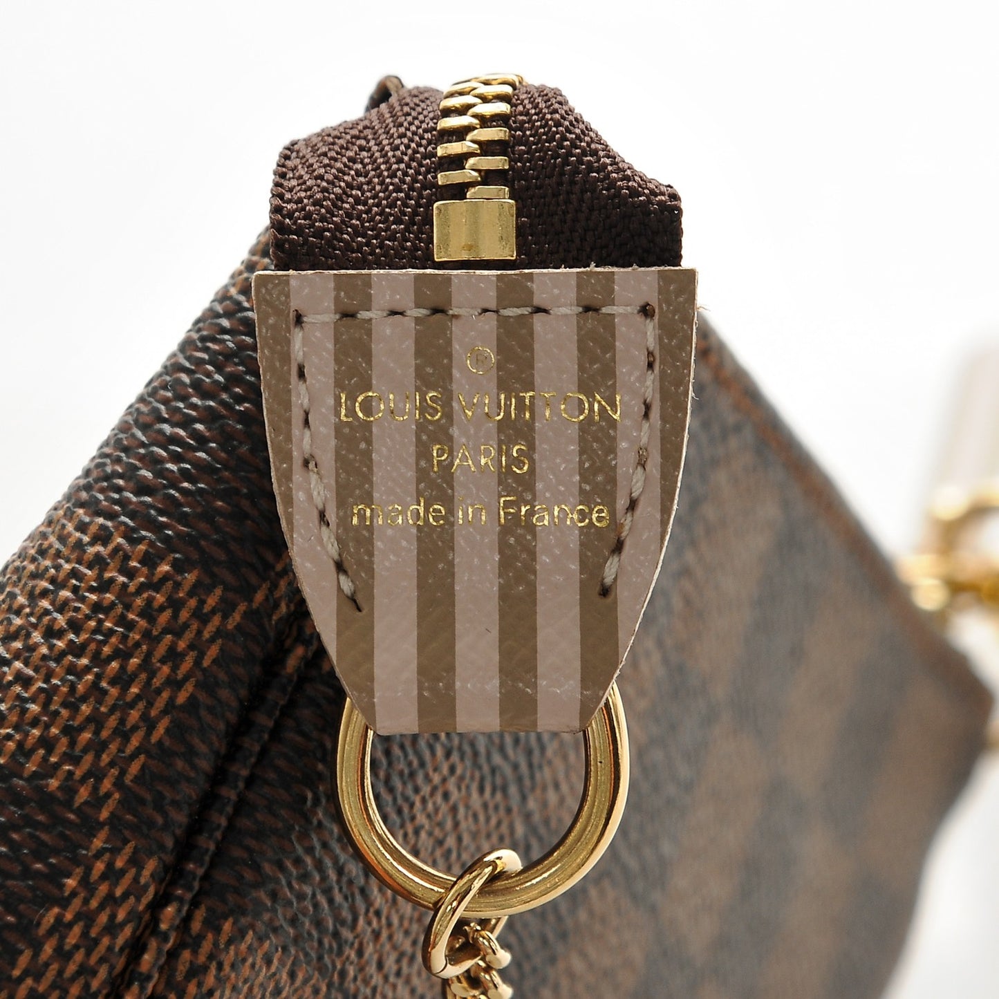 Damier Ebene Trunks and Locks Mini Pochette Accessories