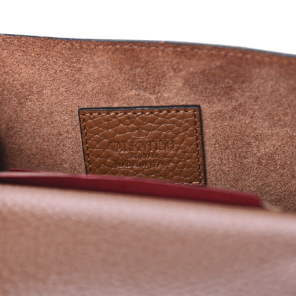 Valentino Garavani Pebbled Calfskin Rockstud Envelope Wallet on Chain Bright Cognac 7 of 8
