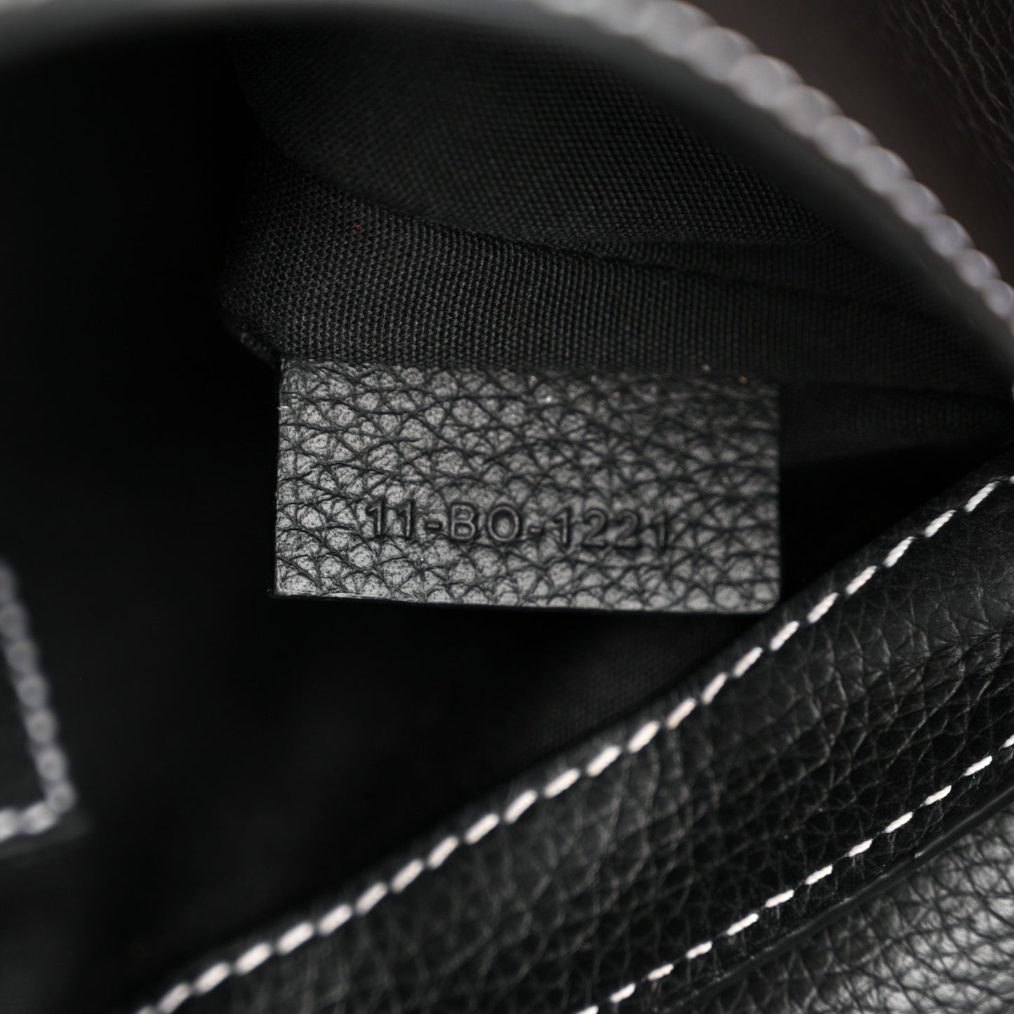 X KAWS Grained Calfskin Saddle Pouch Black