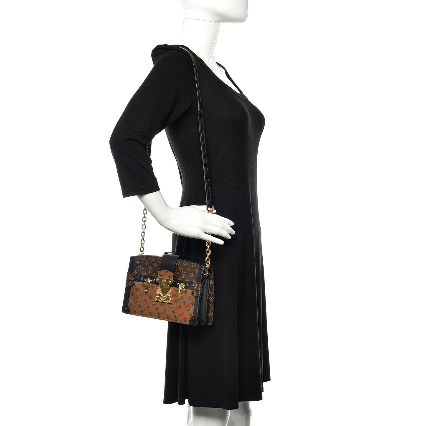 Reverse Monogram Trunk Clutch