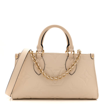 Louis Vuitton Empreinte Monogram Giant OnTheGo East West Creme 1 of 9