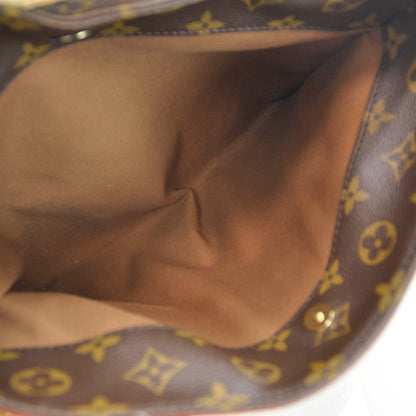 Louis Vuitton Monogram Riveting 6 of 9