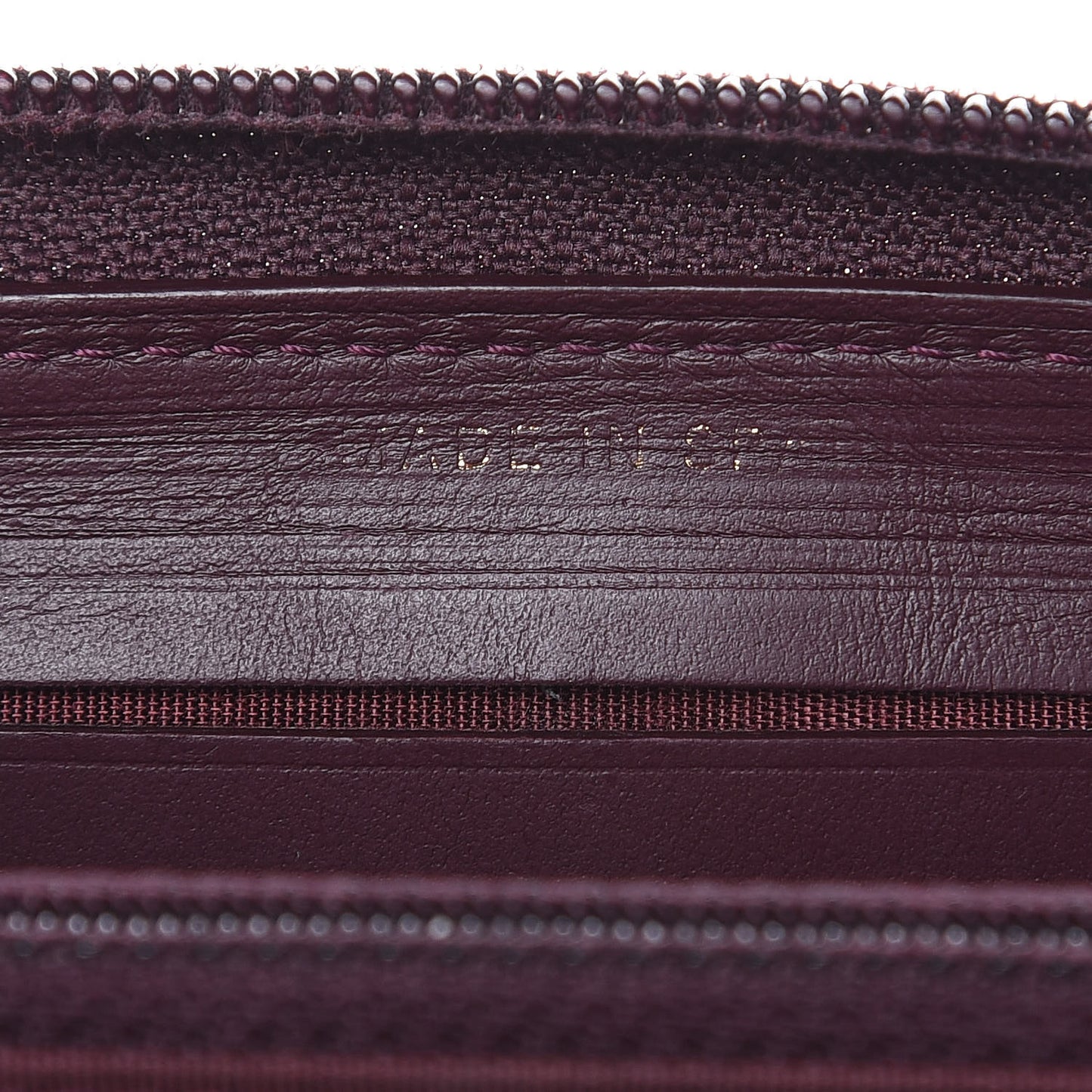 Caviar Quilted Small Boy Zip Around Wallet Dark Purple