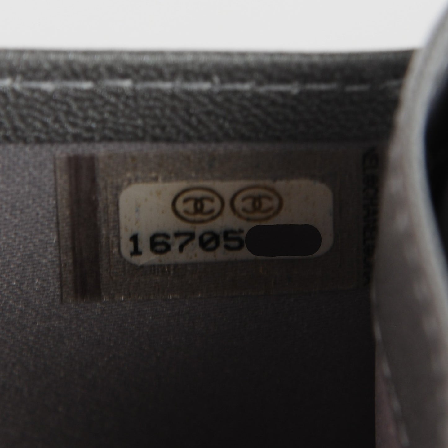 Lambskin Camellia Embossed Yen Wallet Black