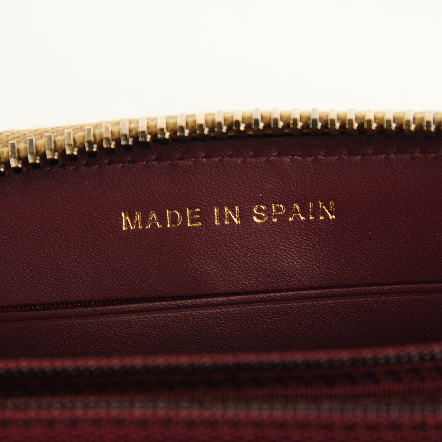 Metallic Calfskin Quilted Zip Around Wallet Gold