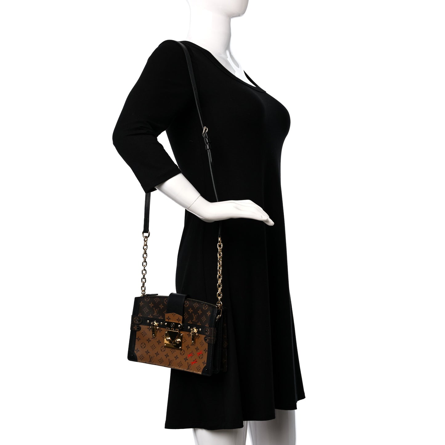 Reverse Monogram Trunk Clutch