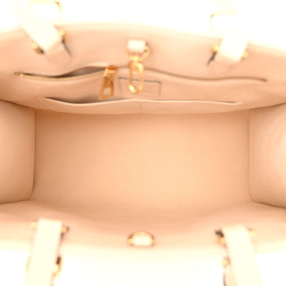 Louis Vuitton Empreinte Monogram Giant Onthego MM Creme 5 of 9