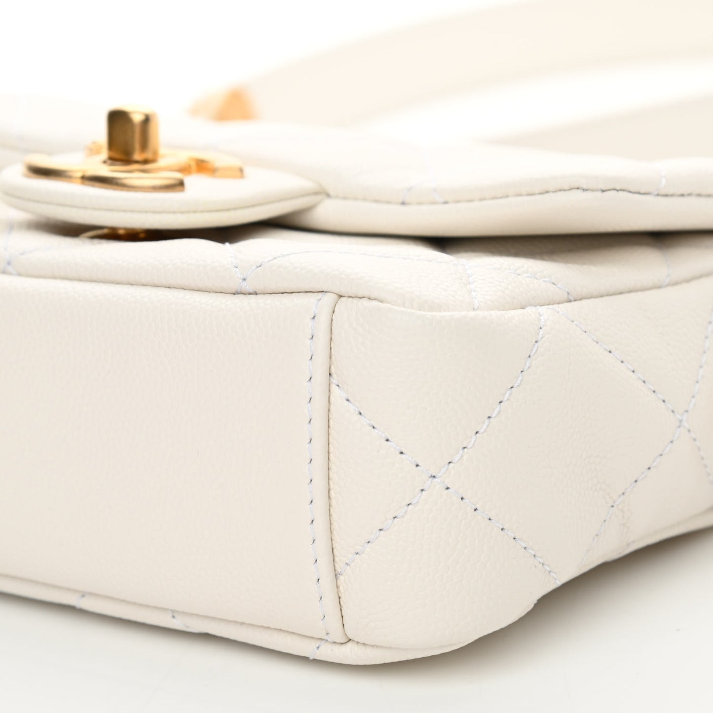 Caviar Quilted Mini Twist Your Buttons Flap White